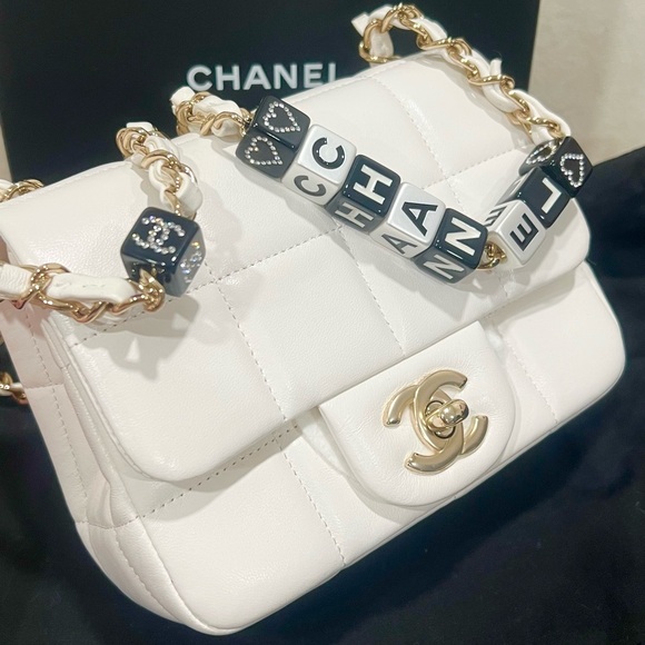 CHANEL Handbags - Chanel White mini Lambskin Monacoco crossbody Flap Bag